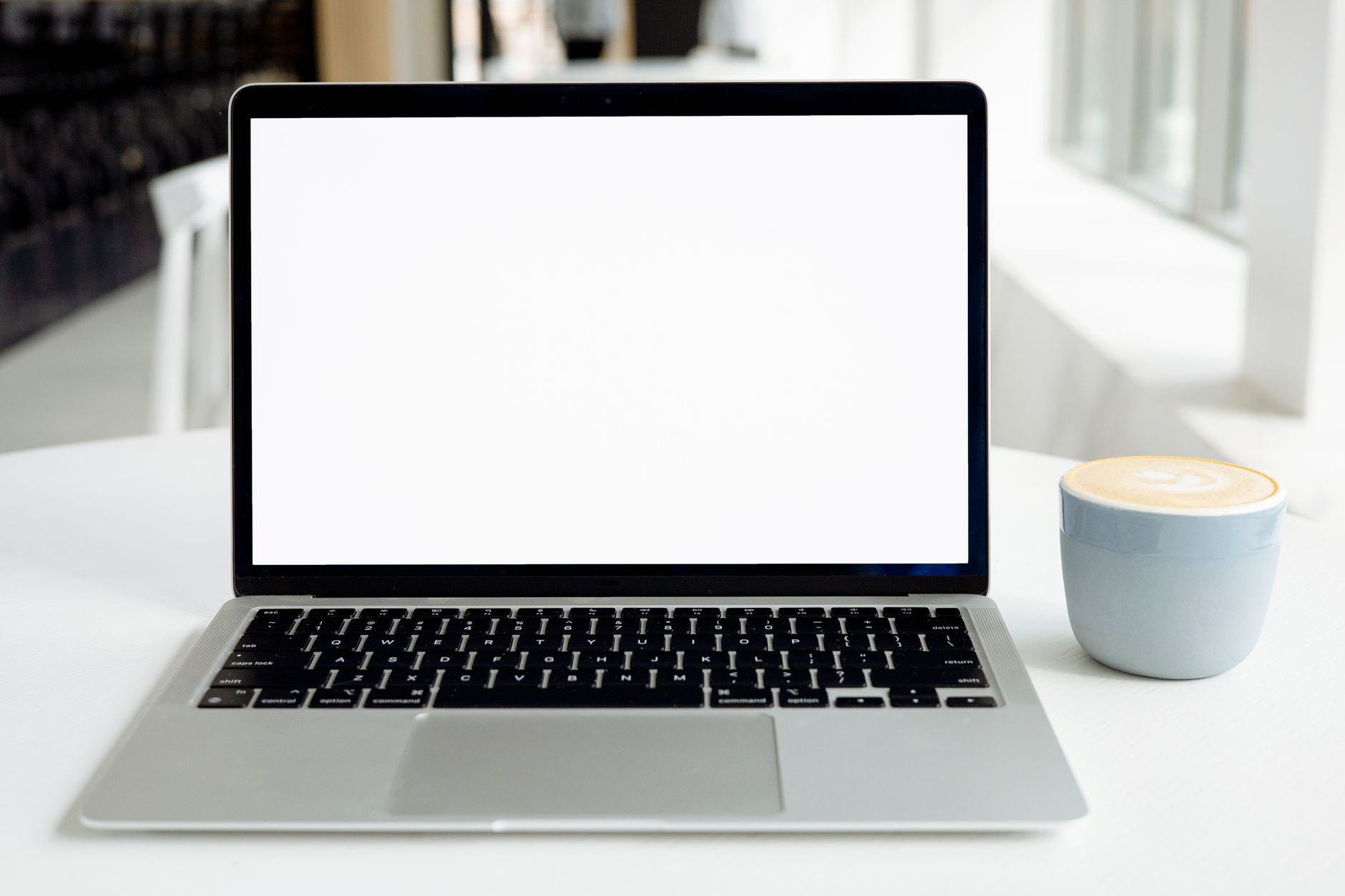 Designer reviewing B2B SaaS homepage design UK 2026 examples on monitor